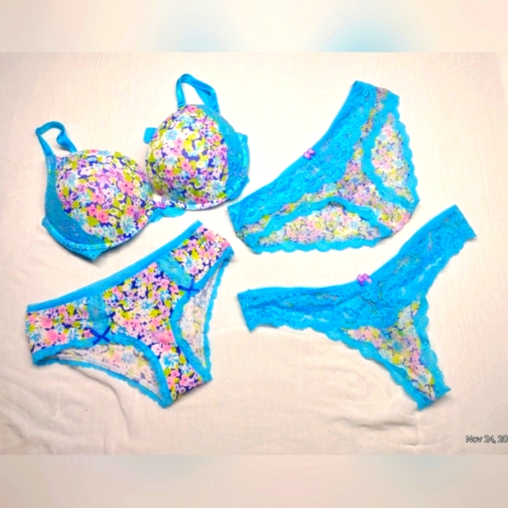 VS bra and multi-panty set. 4 pieces. 34DD and panties are small/medium.
